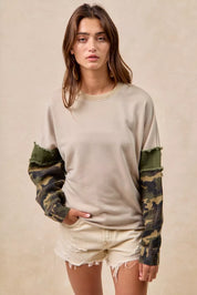 BiBi Camo Sleeve French Terry Top with Frayed Edge | Daverri Fashions
