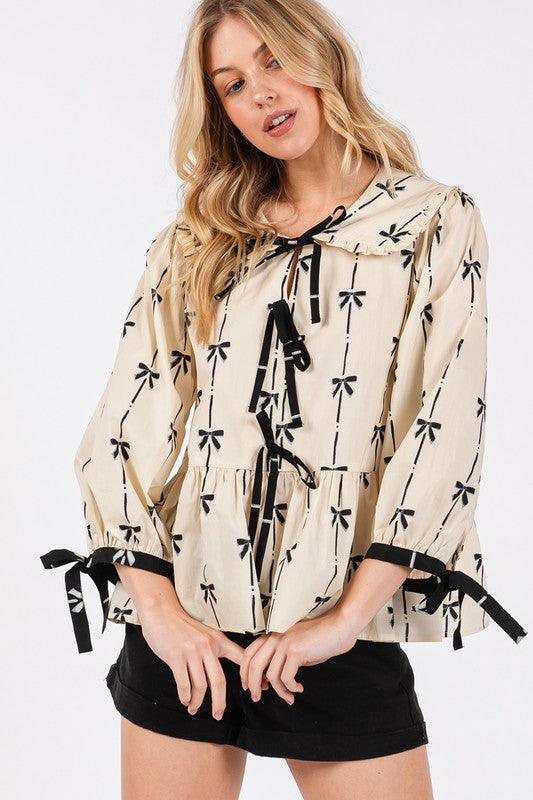 SAGE + FIG Bow Print Tie Front Babydoll Blouse | Blouses Daverri Fashions