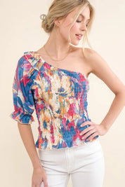 FLORAL And The Why Allover Floral Print Smocked One Shoulder Blouse | Daverri Fashions