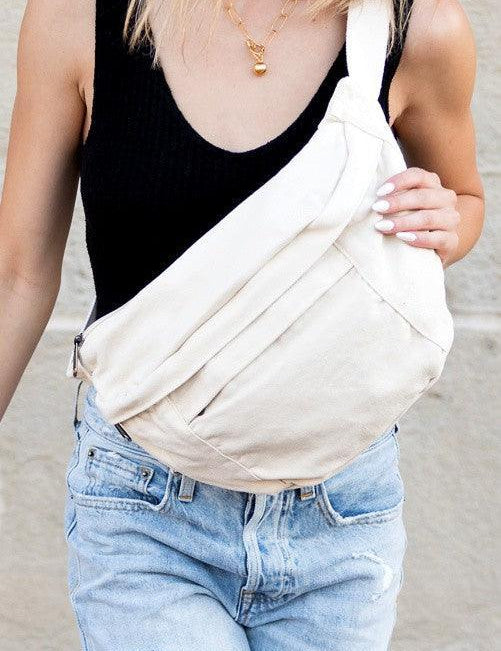 Cream OneSize London Oversized Canvas Crescent Sling Bag | Handbags Daverri Fashions