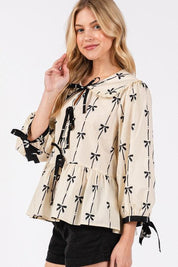 SAGE + FIG Bow Print Tie Front Babydoll Blouse | Blouses Daverri Fashions