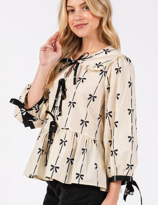 SAGE + FIG Bow Print Tie Front Babydoll Blouse | Blouses Daverri Fashions