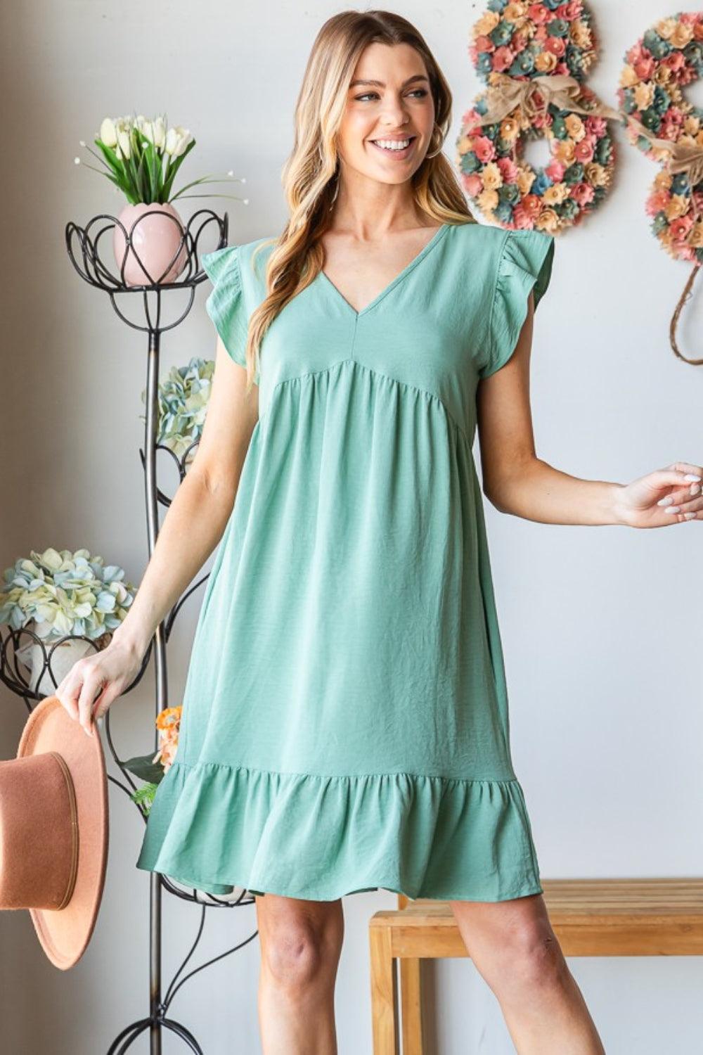 Dusty Sage Heimish Full Size Short Sleeve V Neck Ruffled Hem Dress | Daverri Fashions