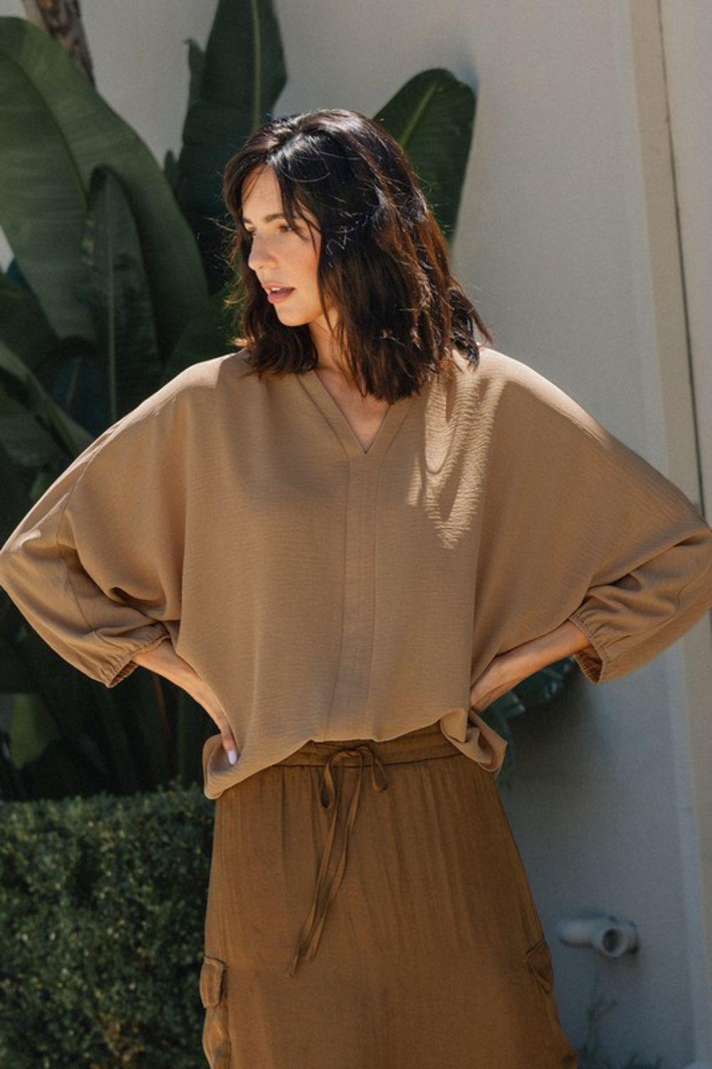 Camel Annie Wear Notched Batwing Sleeve Blouse | Blouses Daverri Fashions