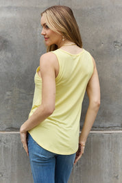 BOMBOM Criss Cross Front Detail Sleeveless Top in Butter Yellow | Tops Daverri Fashions