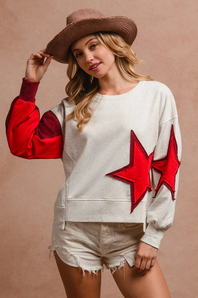 BiBi Star Patch And Spliced Hemline French Terry Long Sleeve Sweatshirt | Daverri Fashions
