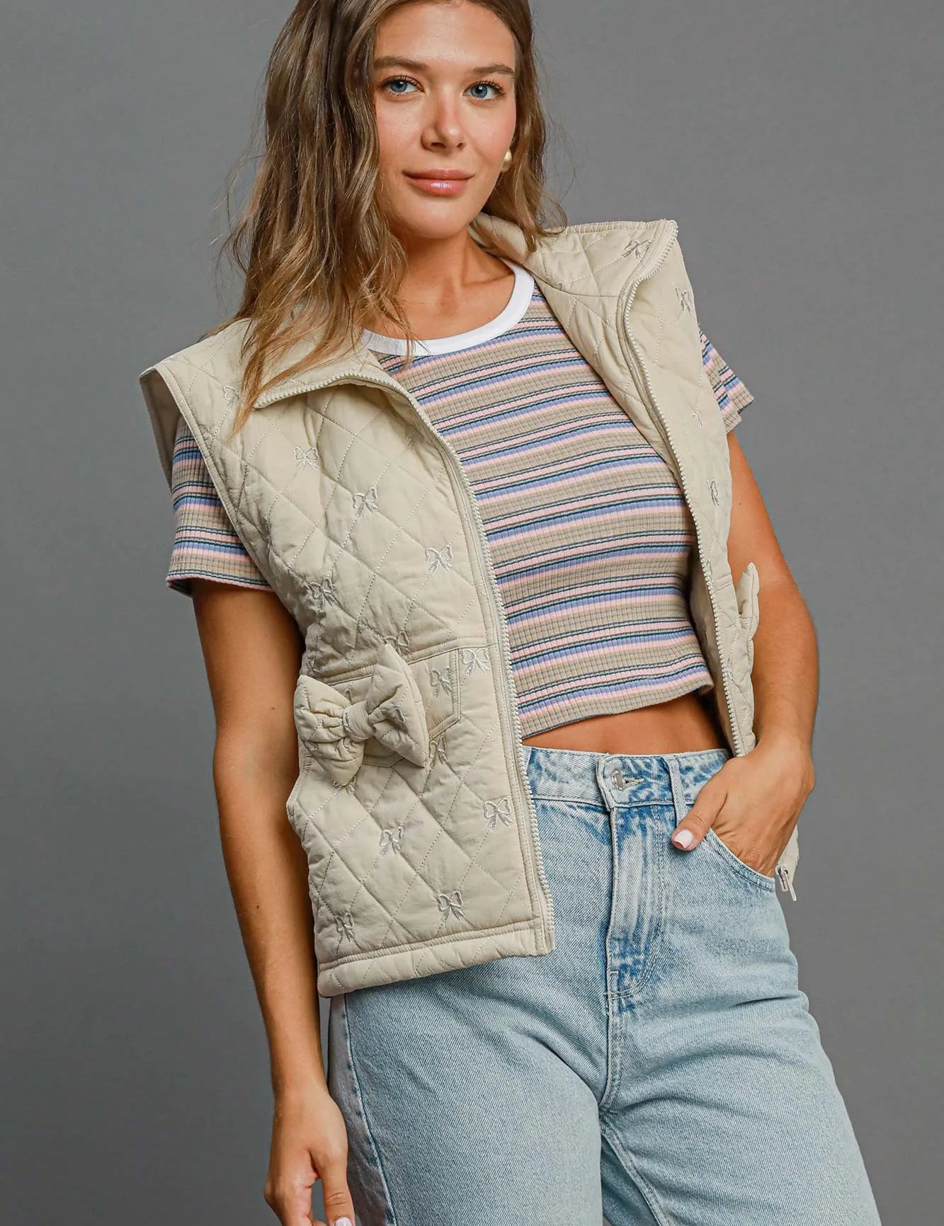 Umgee Sleeveless Quilted Vest with Bow Details | Daverri Fashions