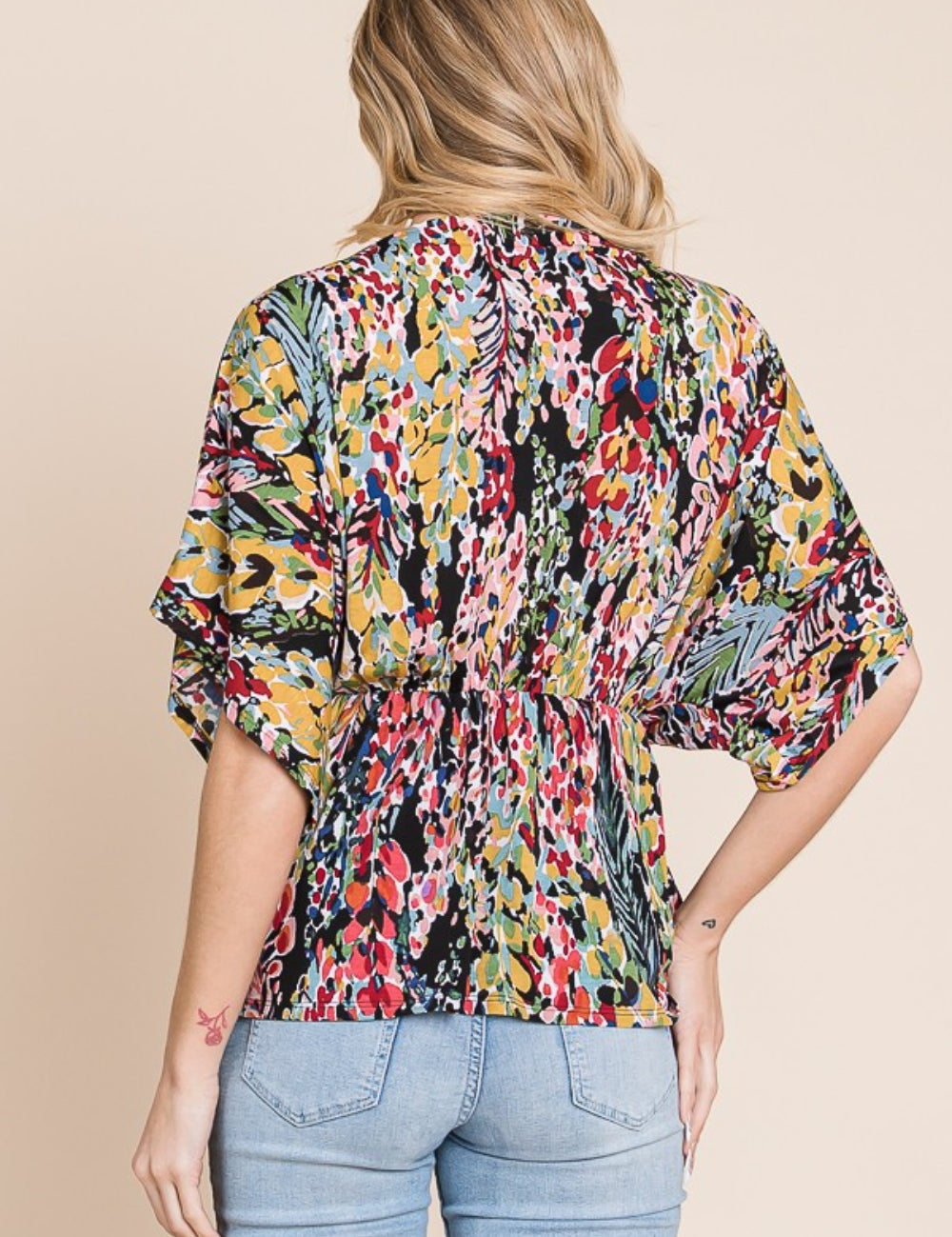 BOMBOM Printed Surplice Peplum Blouse | Daverri Fashions