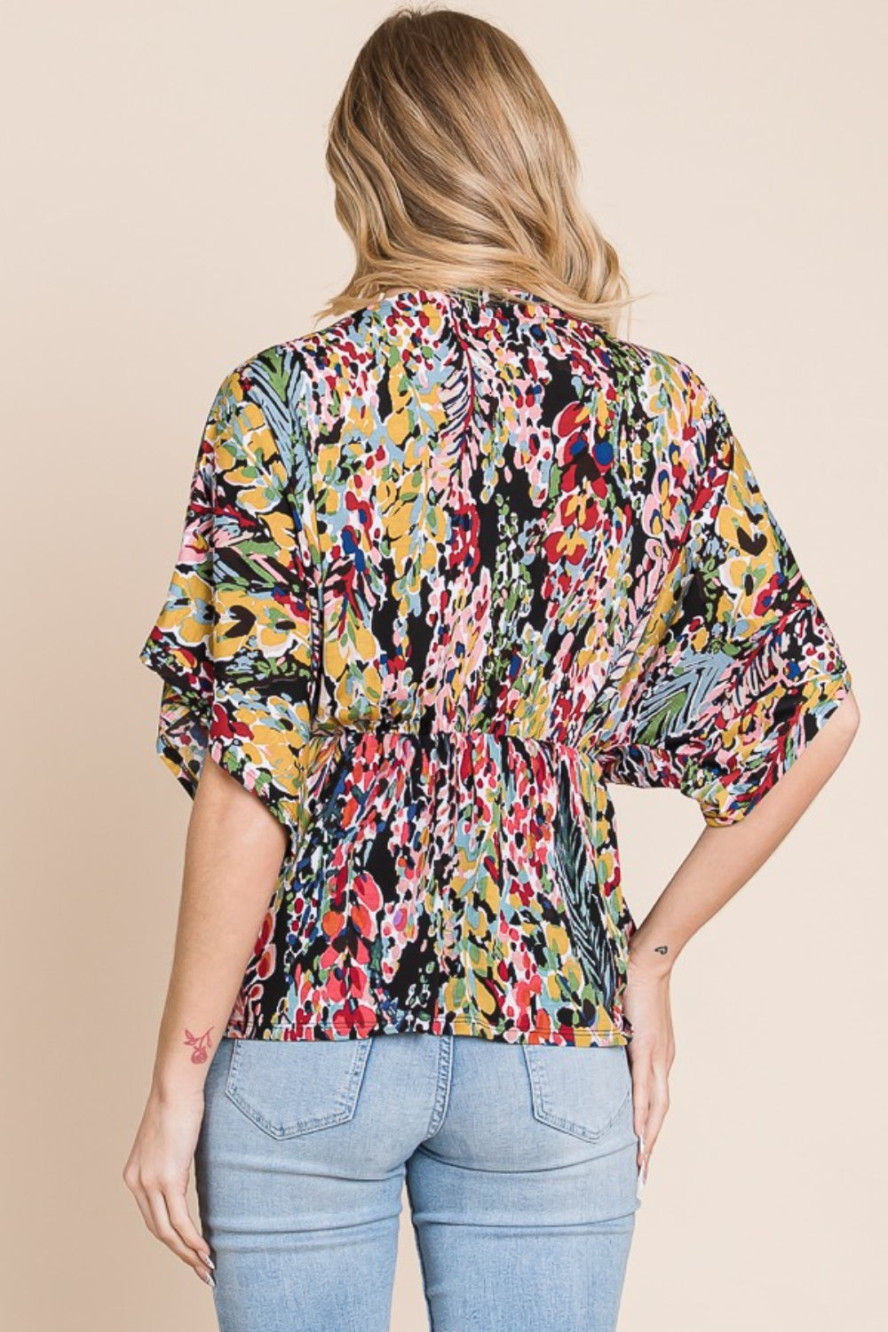 BOMBOM Printed Surplice Peplum Blouse | Daverri Fashions