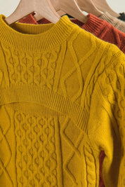 BiBi Cable-Knit Sweater with Cut Out Chest Detail | Daverri Fashions