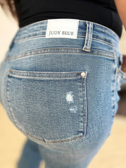 Judy Blue Full Size Mid Rise Destroyed Hem Distressed Jeans | Jeans Daverri Fashions