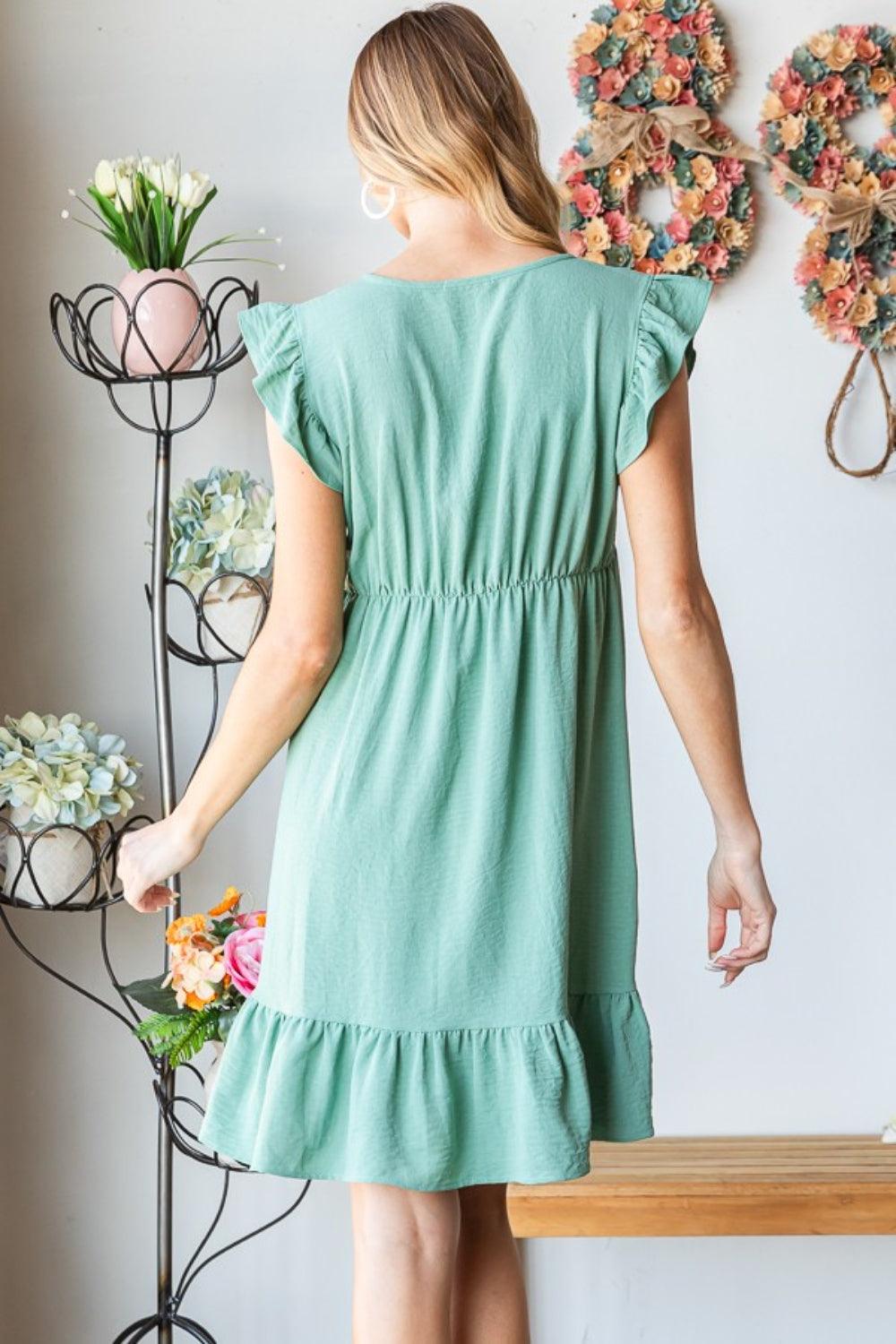 Heimish Full Size Short Sleeve V Neck Ruffled Hem Dress | Daverri Fashions