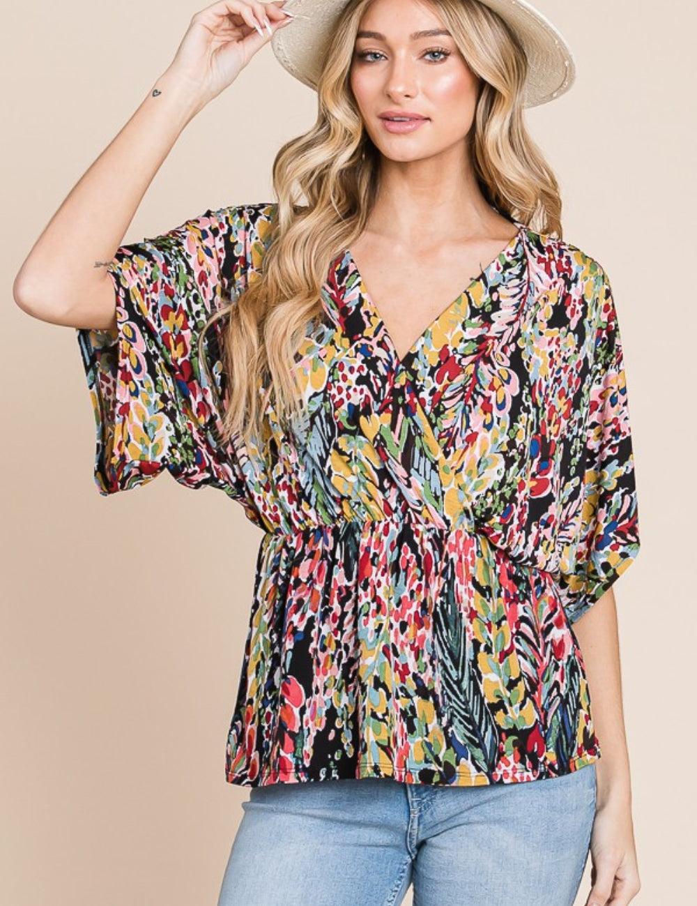 Floral BOMBOM Printed Surplice Peplum Blouse | Daverri Fashions