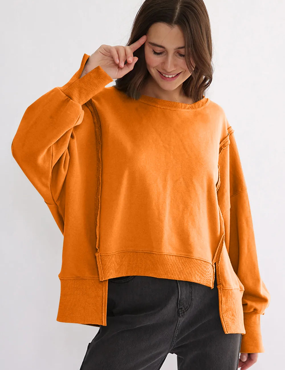 Tangerine One Size Exposed Seam High-Low Long Sleeve Sweatshirt | Daverri Fashions