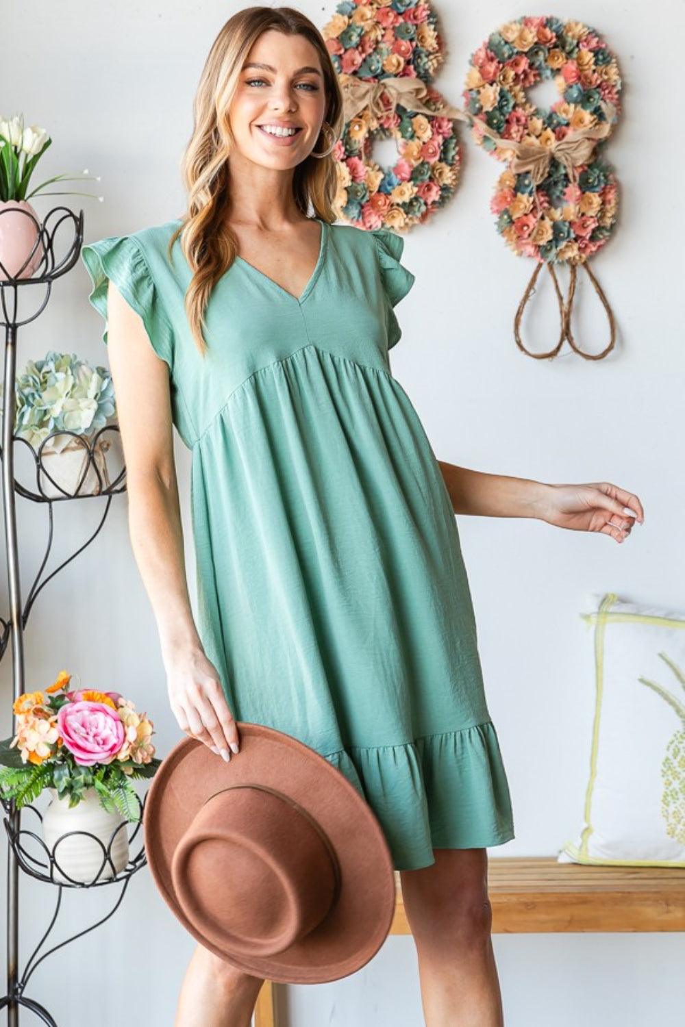 Heimish Full Size Short Sleeve V Neck Ruffled Hem Dress | Daverri Fashions