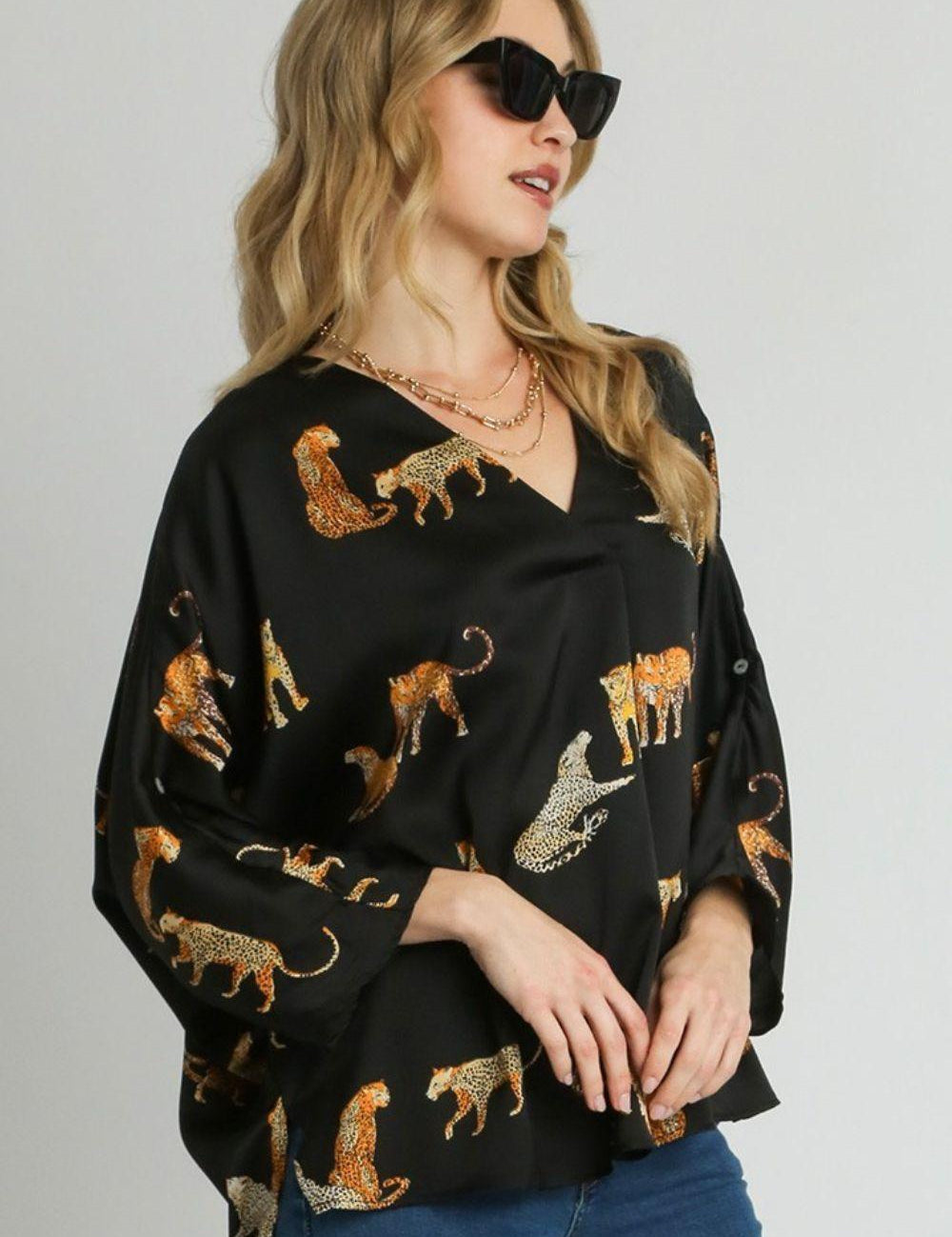 Black Umgee Full Size High-Low Satin Animal Print V-Neck Blouse Plus Size | Blouses Daverri Fashions