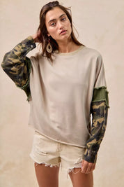 BiBi Camo Sleeve French Terry Top with Frayed Edge | Daverri Fashions