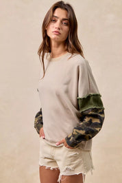 BiBi Camo Sleeve French Terry Top with Frayed Edge | Daverri Fashions