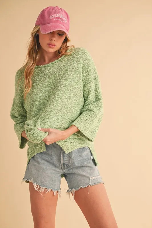 Aemi + Co Side Slit Ribbed Hem Round Neck Sweater | Daverri Fashions