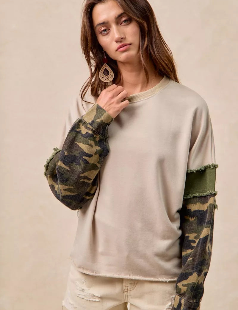 BiBi Camo Sleeve French Terry Top with Frayed Edge | Daverri Fashions
