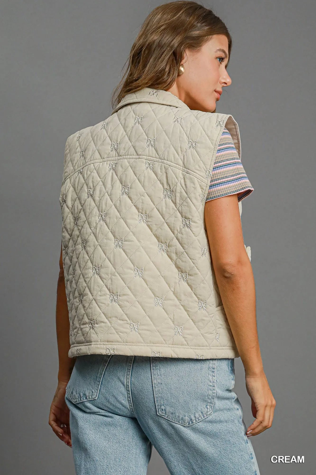 Umgee Sleeveless Quilted Vest with Bow Details | Daverri Fashions