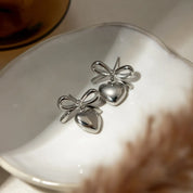 Stainless Steel Bow & Heart Drop Earrings | Earrings Daverri Fashions