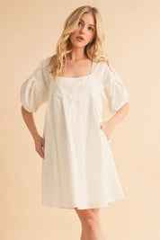 White Aemi + Co Square Neck Babydoll Dress with Pockets | Daverri Fashions