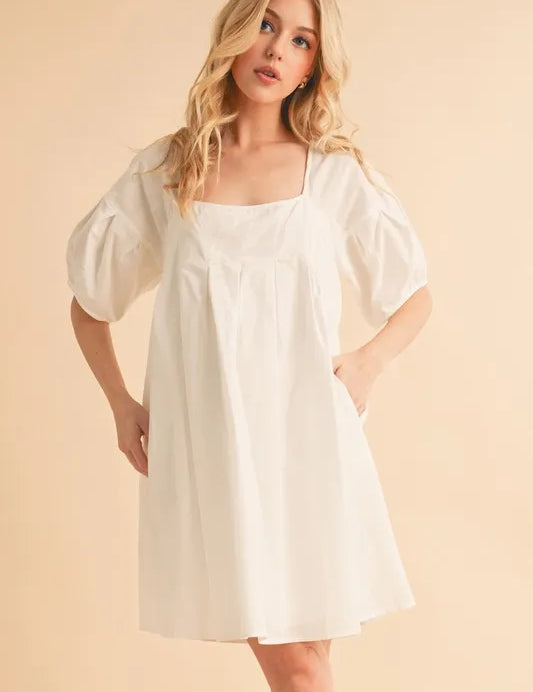 White Aemi + Co Square Neck Babydoll Dress with Pockets | Daverri Fashions