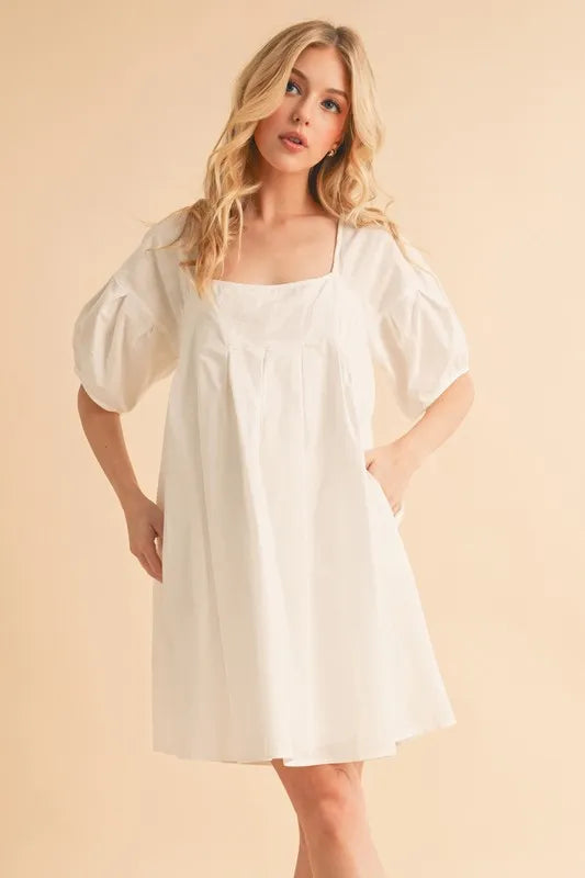 White Aemi + Co Square Neck Babydoll Dress with Pockets | Daverri Fashions