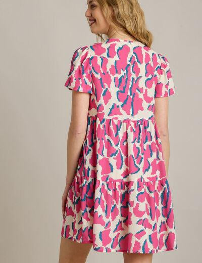 Umgee Full Size Abstract Print Pleat Detail Short Sleeve V-Neck Tiered Dress Plus Size | Daverri Fashions