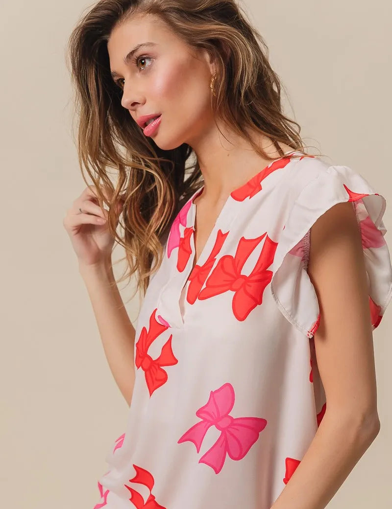 IVO RED FUCHSIA BiBi Bow Printed Woven Ruffled Sleeves V Neck Top | Tops Daverri Fashions