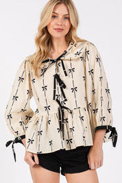 SAGE + FIG Bow Print Tie Front Babydoll Blouse | Blouses Daverri Fashions