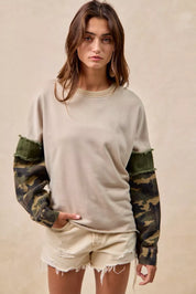 BiBi Camo Sleeve French Terry Top with Frayed Edge | Daverri Fashions