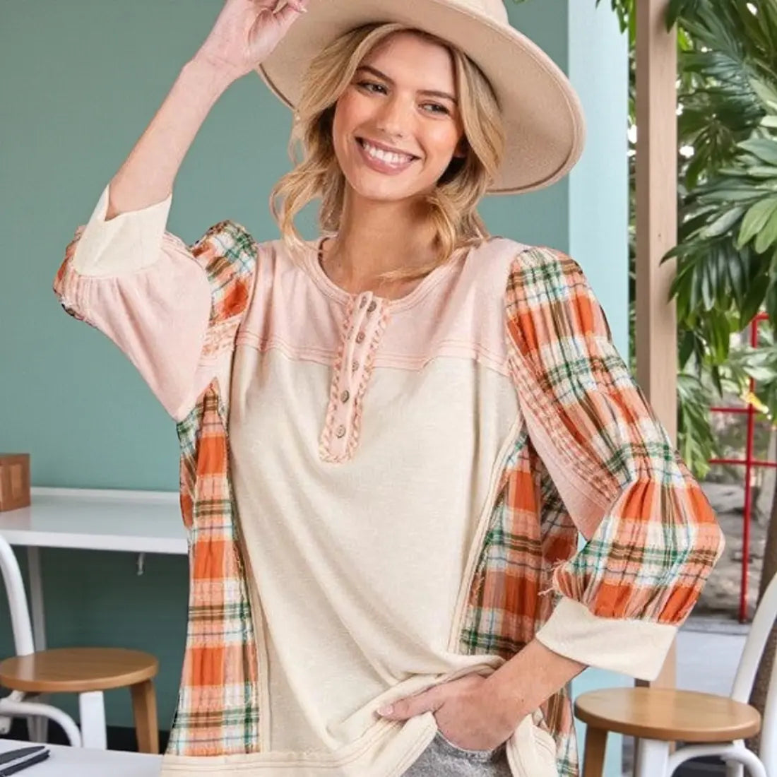 Soft peach and cream layered top with plaid sleeves from SAGE + FIG
