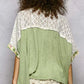 Soft sage green textured POL Sage Floral Patchwork Lace Accent Blouse with white lace yoke and floral sleeves