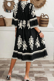 Black and white printed embroidered dress with bell sleeves