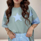 Light blue oversized t-shirt with frayed denim star patches