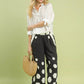 Black Umgee hexagon print wide-leg pants with scalloped hem