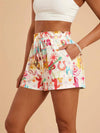 Drawstring printed shorts with colorful horseshoes, guitars and cacti pattern