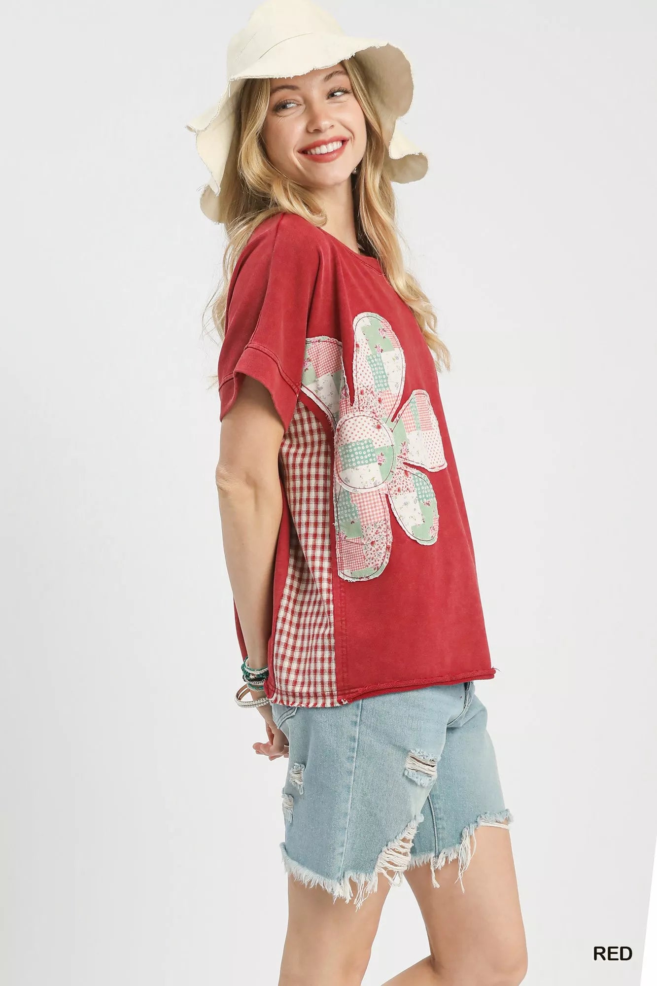 Red Umgee mineral wash French terry top with pink green white patchwork flowers