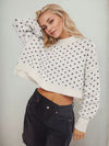 Daverri white cropped heart-patterned round neck sweater with black butterfly prints and large bow sleeve