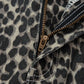Leopard-print denim jacket with brass zipper and frayed hem on Daverri jeans
