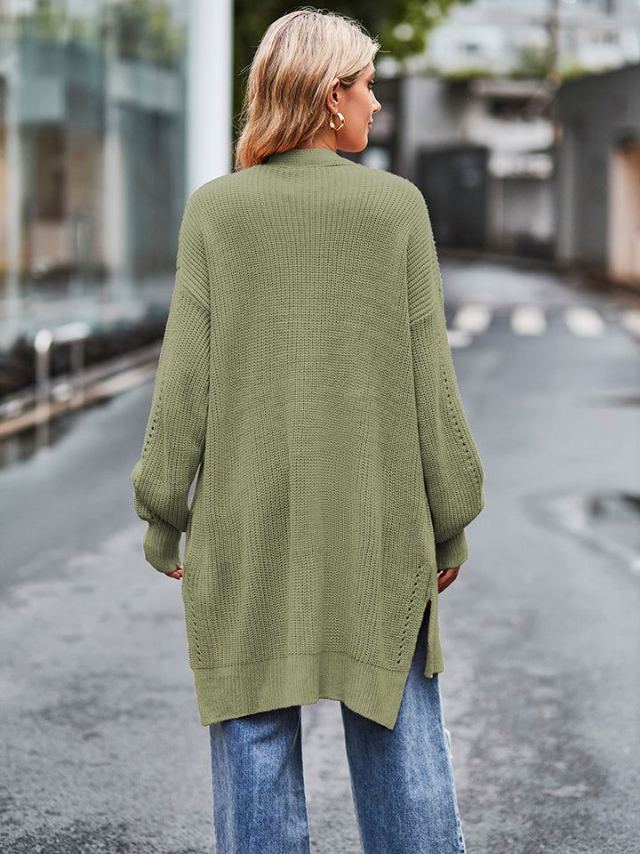 Olive green long-sleeve waffle-knit cardigan with textured weave and side slits
