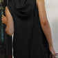 Black sleeveless hooded romper dress with vertical seams and half zip