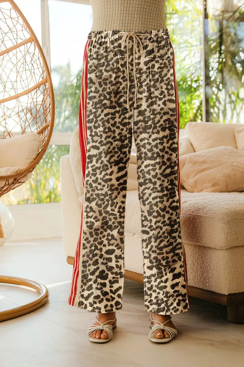 BiBi leopard print track pants with red side stripes and drawstring waist