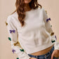 White SO ME Mardi Gras Glitter Bow Sweater with colorful sequins