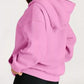 Vibrant pink kangaroo pocket long sleeve hoodie with relaxed fit