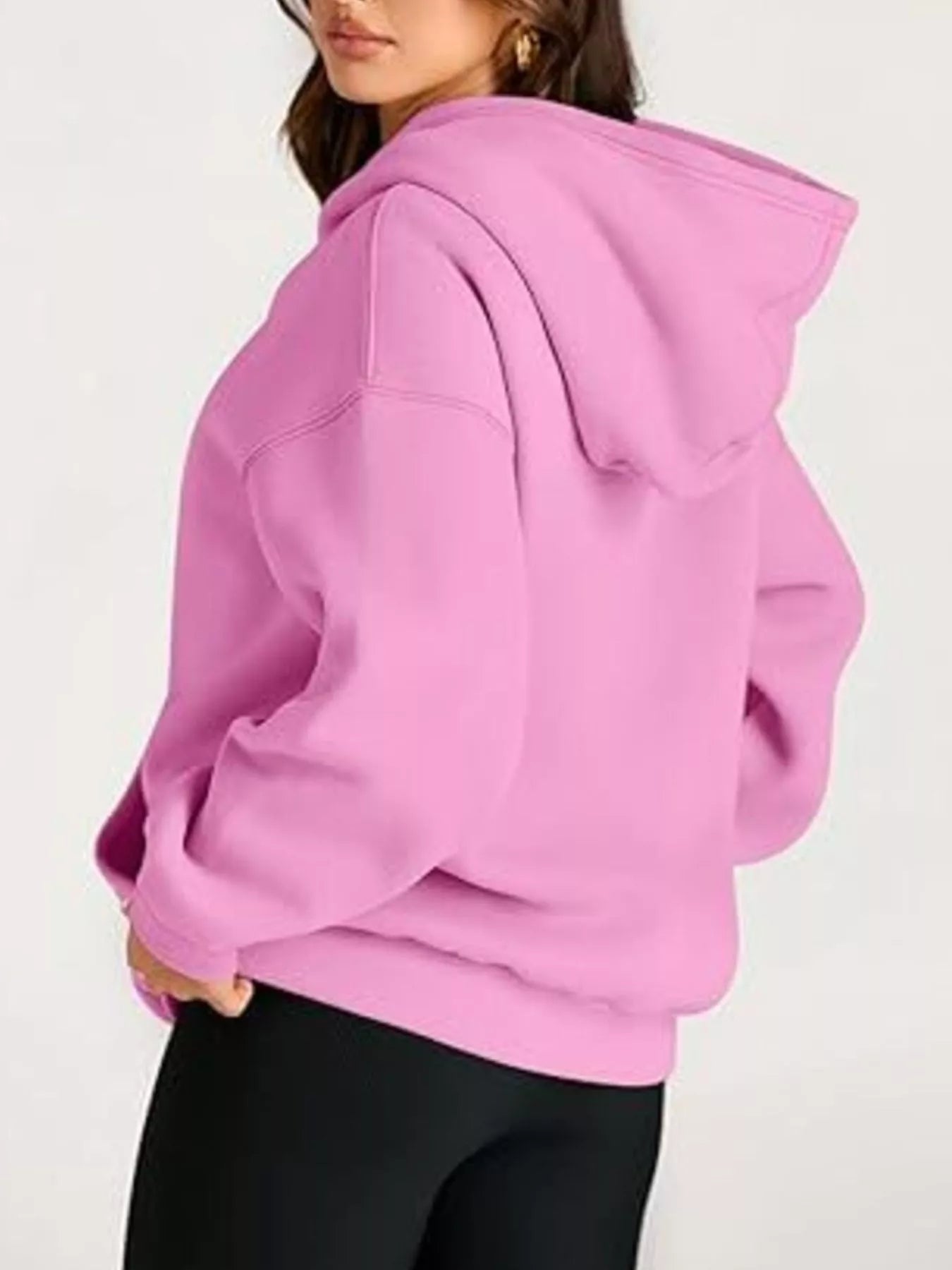 Vibrant pink kangaroo pocket long sleeve hoodie with relaxed fit