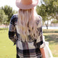 Soft pink felt fedora hat with curved brim on Daverri plaid shirt