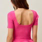 SO ME ribbed knit short sleeve peplum sweater top in vibrant pink